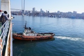 Docking a ferry sideways requires the help from a tugboat