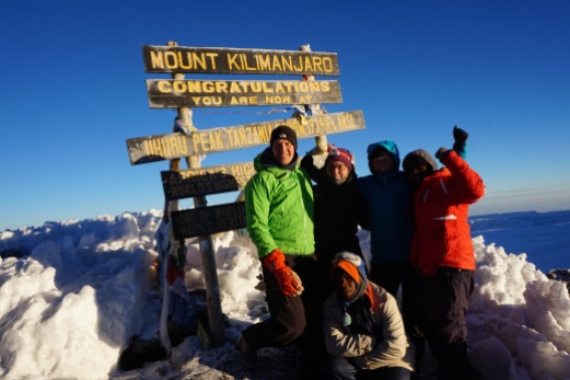 Ulrik, Gitte, Tine, Issa and Michael on top of Kilimanjaro